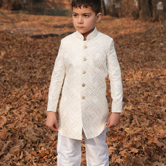 Boy wearing Luzito Sereno Sherwani styled for weddings and festive family celebrations.