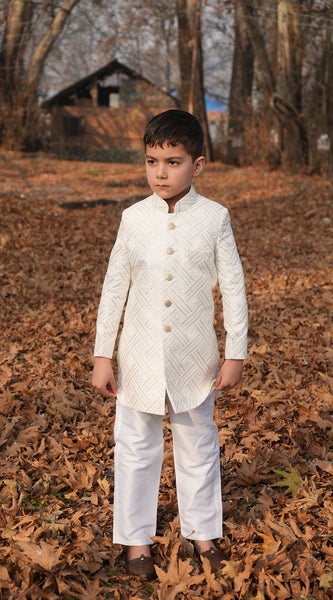Boy wearing Luzito Sereno Sherwani styled for weddings and festive family celebrations.